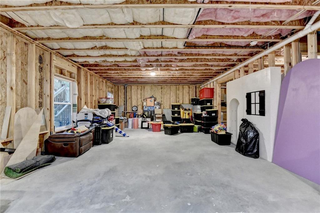 298 Ryston Way Grayson, GA 30017 - Photo 38 of 51 a view of a garage with cars