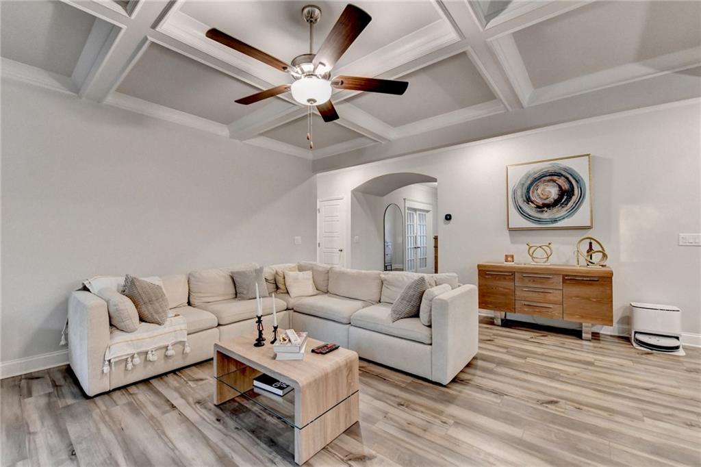298 Ryston Way Grayson, GA 30017 - Photo 7 of 51 a living room with furniture and a wooden floor