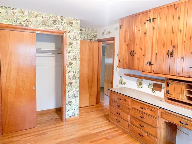 a bathroom with a double vanity sink and a shower