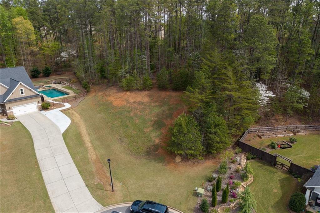18 Pinoak Trail Cartersville, GA 30121 - Photo 3 of 6 a view of a swimming pool with a yard