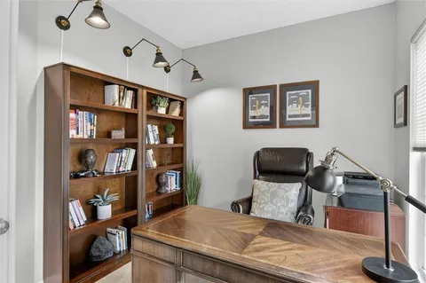 a living room with furniture and a table