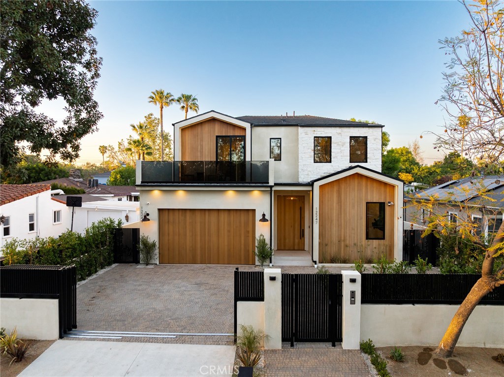 12249 Addison Street Valley Village, CA 91607 - Photo 2 of 60 a front view of a house with a yard