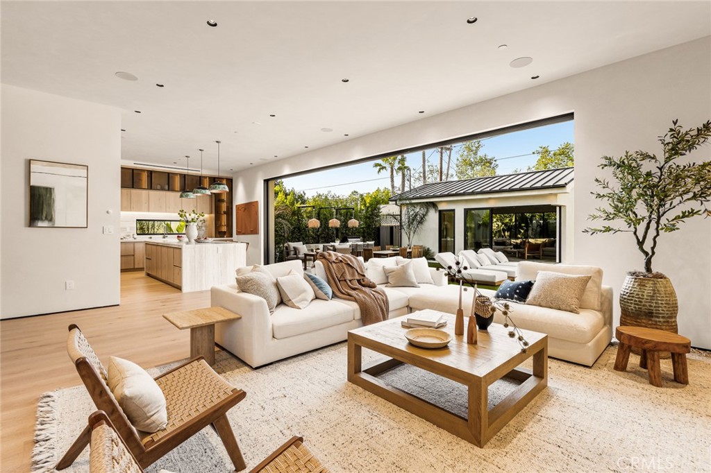 12249 Addison Street Valley Village, CA 91607 - Photo 22 of 60 a living room with furniture and a large window