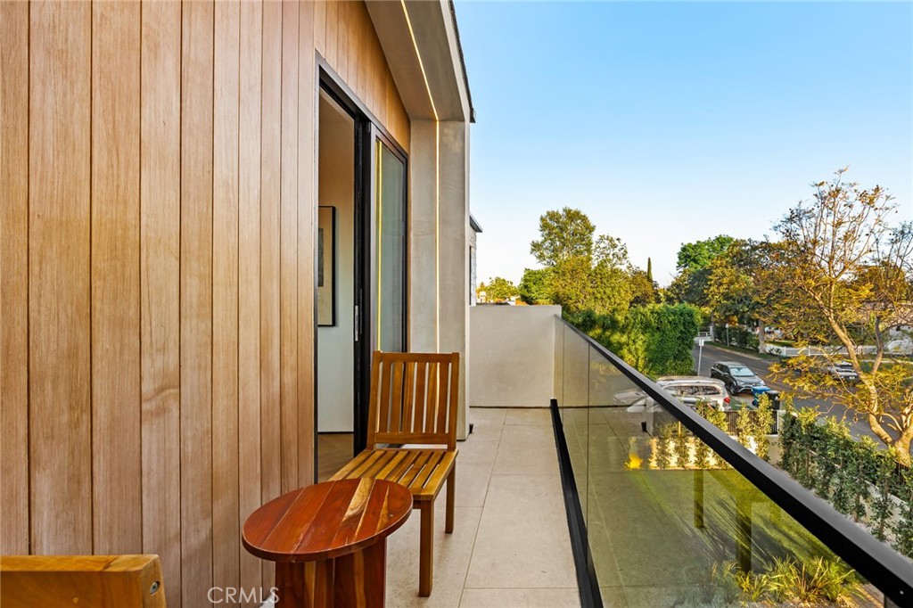 12249 Addison Street Valley Village, CA 91607 - Photo 44 of 60 a view of a balcony with chairs