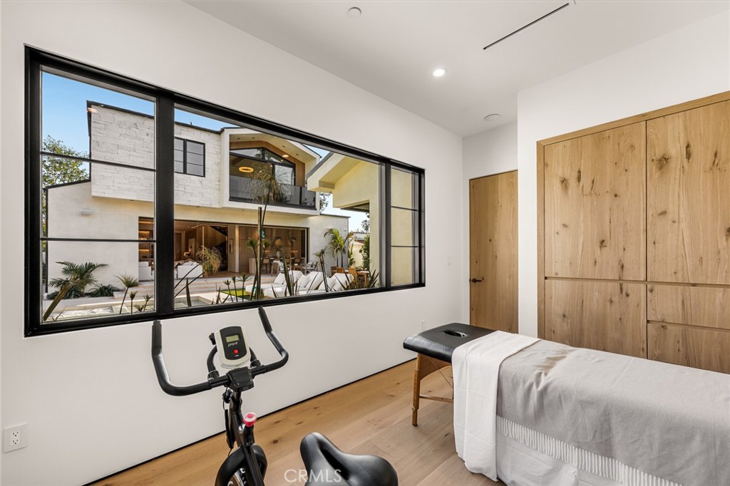 12249 Addison Street Valley Village, CA 91607 - Photo 60 of 60 a room with gym equipment