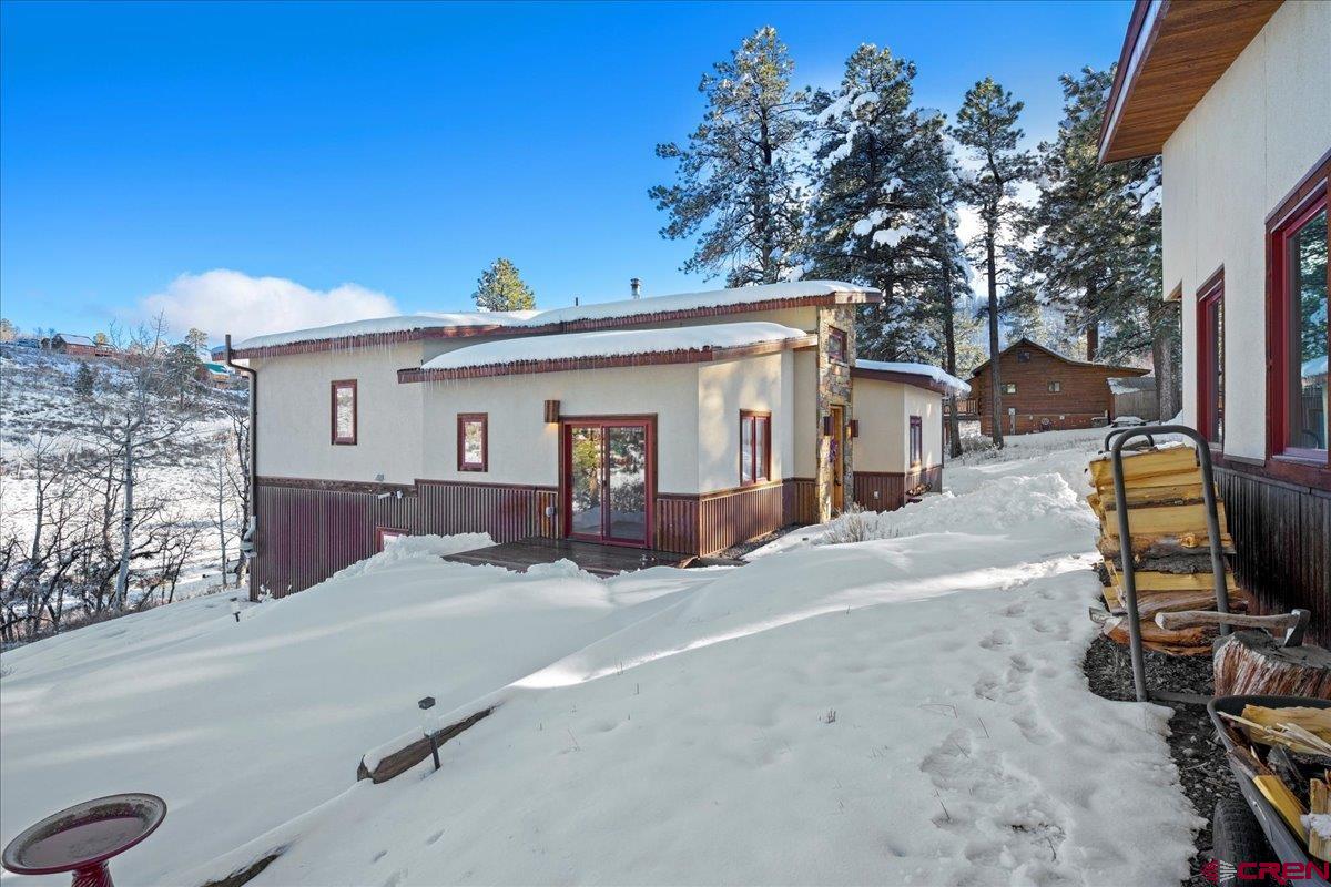 1578 Aspen Drive Ridgway, CO 81432 - Photo 19 of 45 a view of a house with a patio