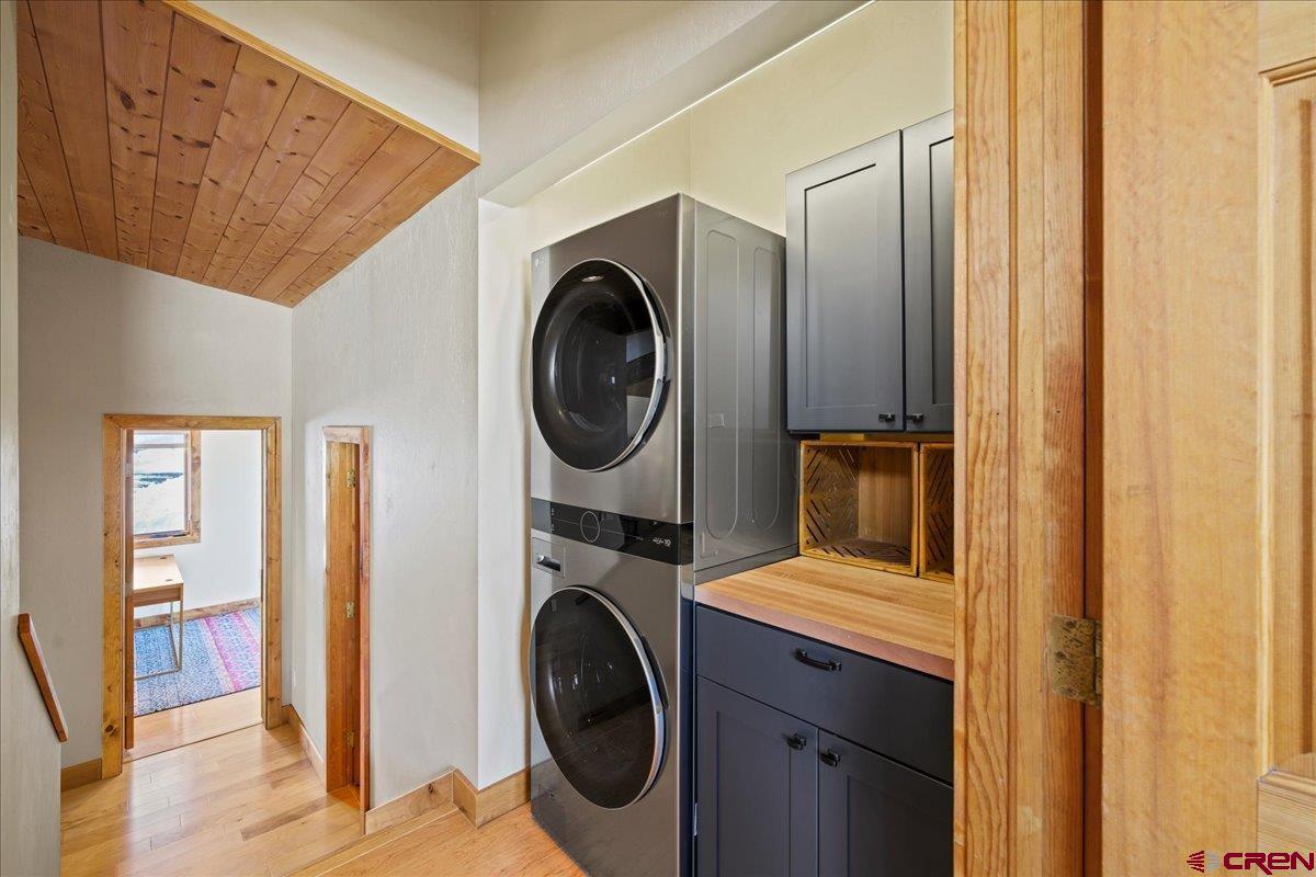 1578 Aspen Drive Ridgway, CO 81432 - Photo 29 of 45 a view of a hallway with washer and dryer