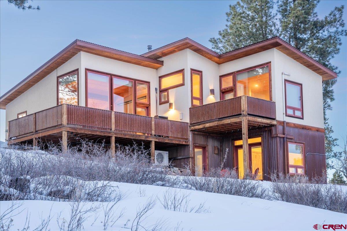 1578 Aspen Drive Ridgway, CO 81432 - Photo 3 of 45 a view of a house with a yard and balcony
