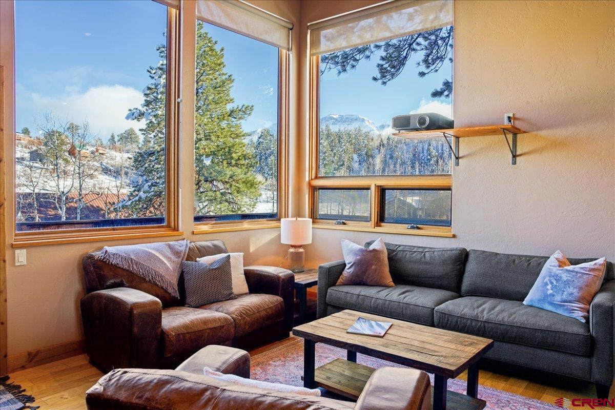 1578 Aspen Drive Ridgway, CO 81432 - Photo 7 of 45 a living room with furniture and a large window