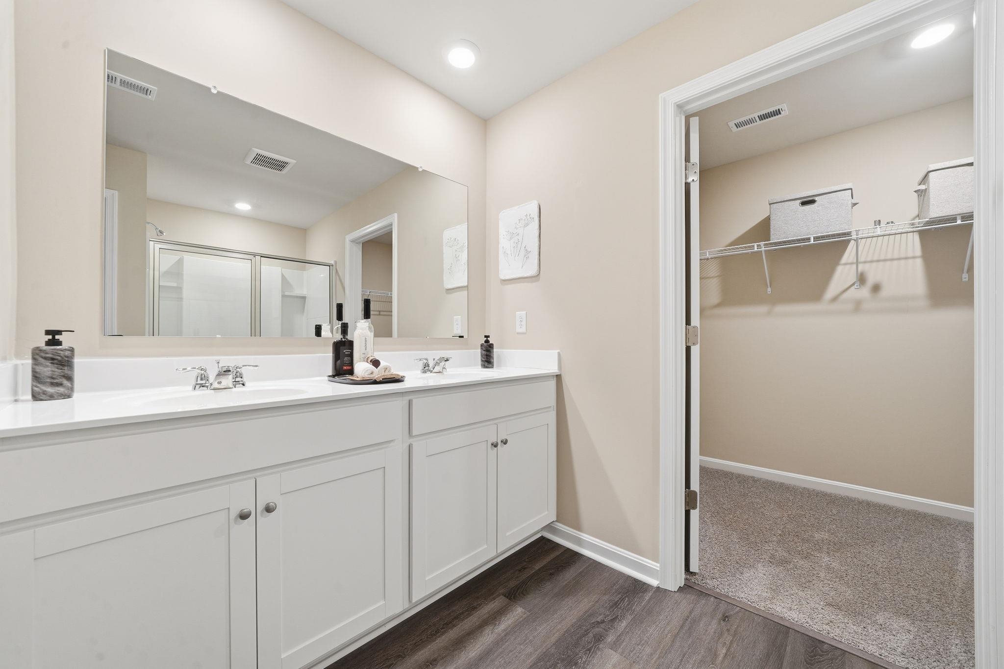109 Meadow Ridge Way Staunton, VA 24401 - Photo 24 of 29 a bathroom with a double vanity sink and mirror