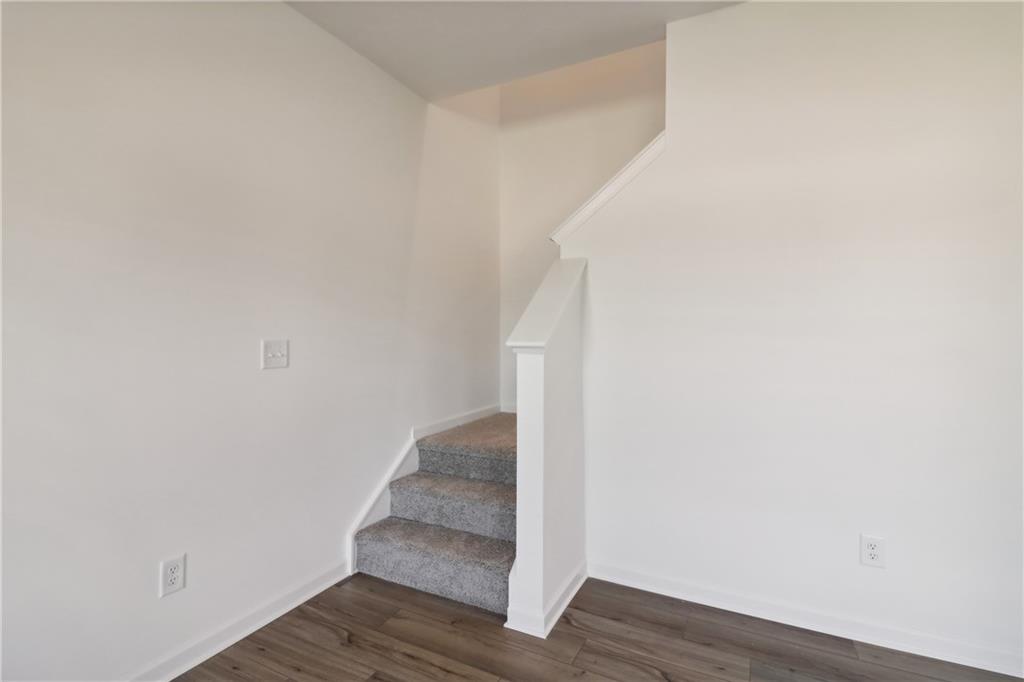 2115 Boxwood Circle Conyers, GA 30013 - Photo 15 of 42 a view of an entryway with wooden floor