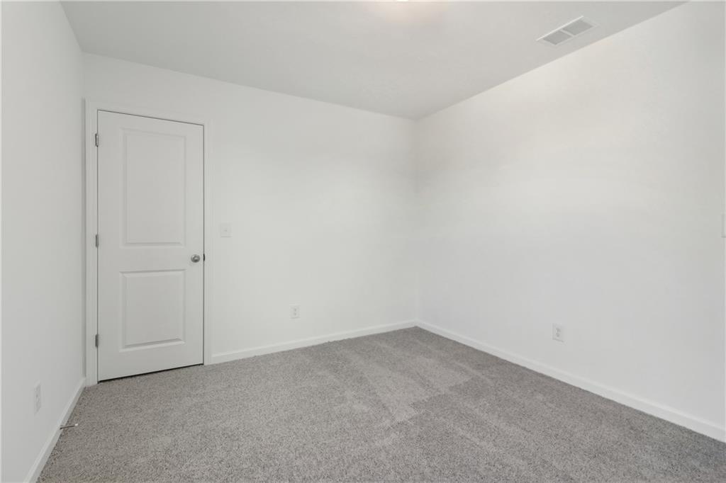 2115 Boxwood Circle Conyers, GA 30013 - Photo 26 of 42 a view of an empty room