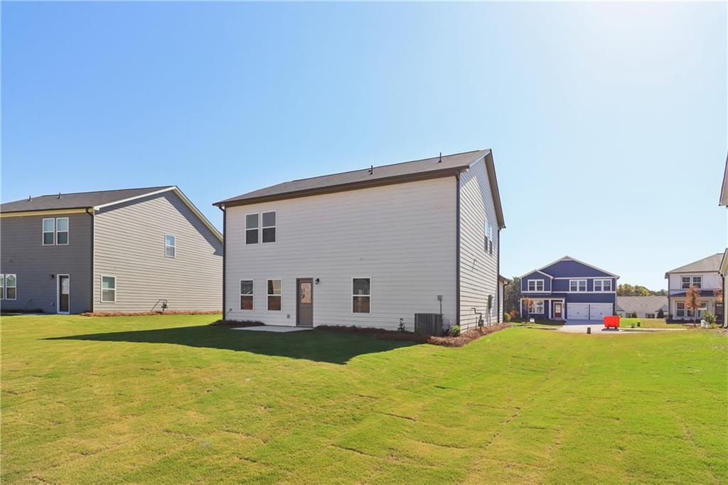 2115 Boxwood Circle Conyers, GA 30013 - Photo 31 of 42 a house view with swimming pool in front of it