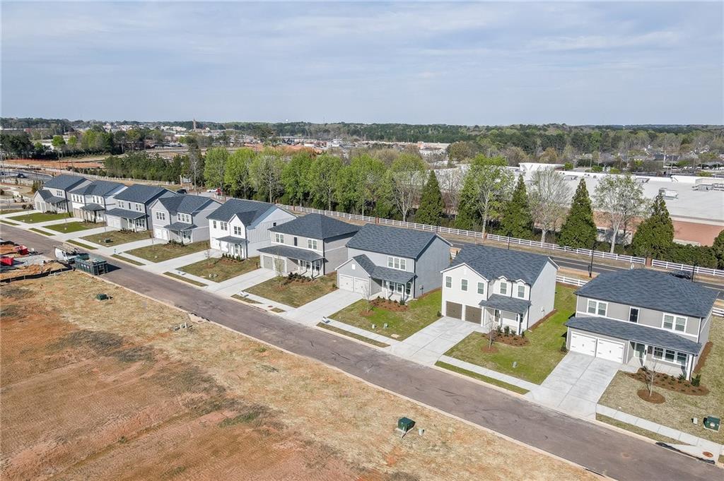 2115 Boxwood Circle Conyers, GA 30013 - Photo 35 of 42 a view of a terrace with couches and city view
