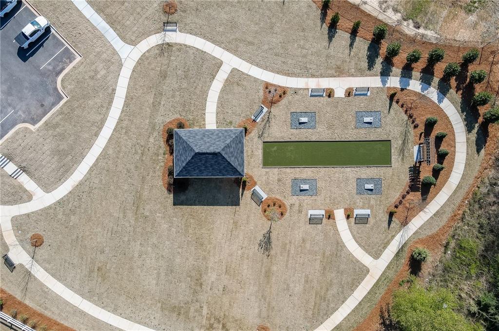 2115 Boxwood Circle Conyers, GA 30013 - Photo 37 of 42 view of living room with furniture and kitchen view