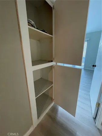 a view of an empty walk in closet