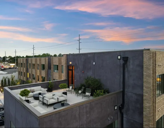 a view of a terrace with furniture