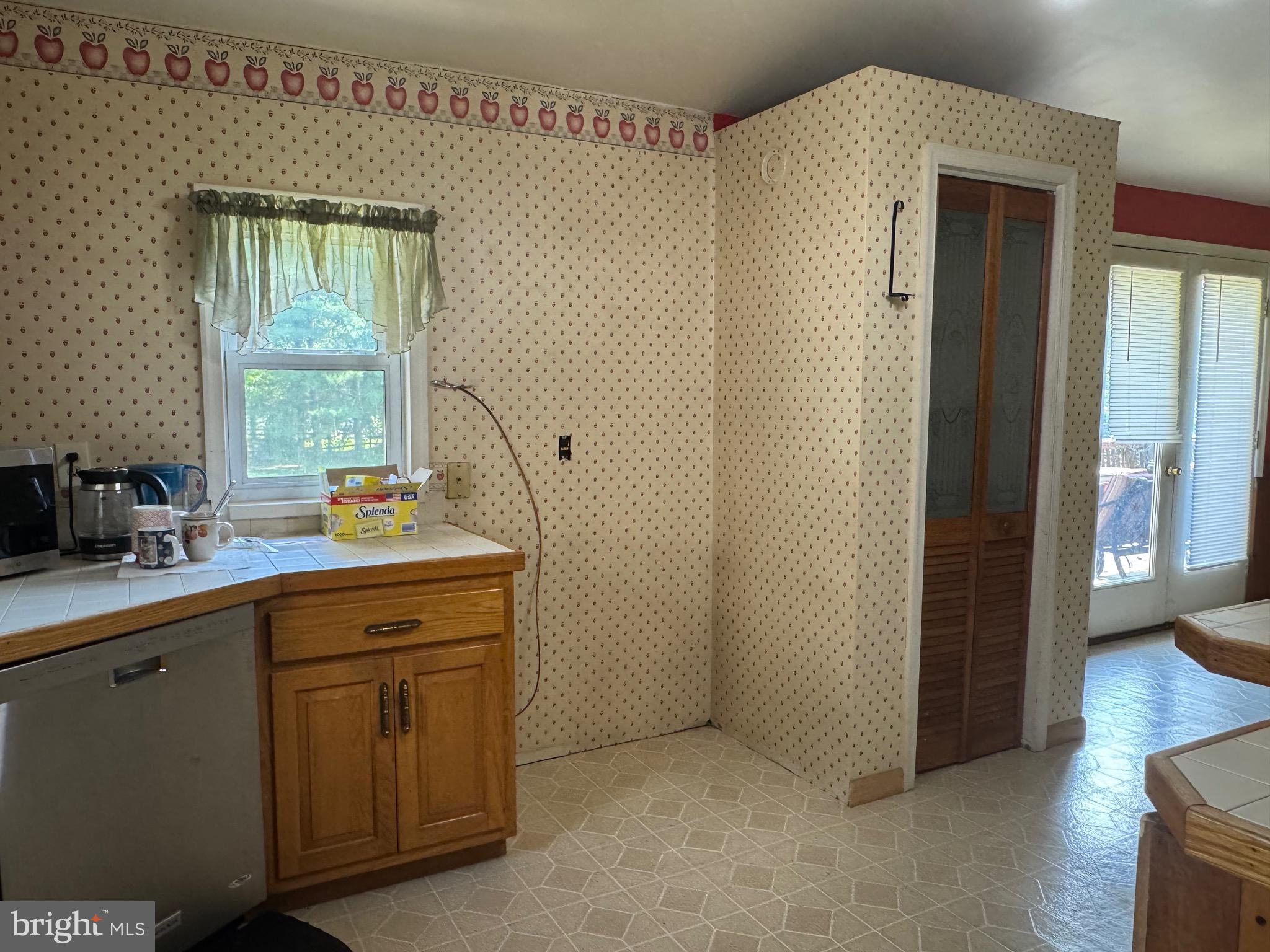 304 Cool Hollow Road Falling Waters, WV 25419 - Photo 18 of 42 a room with a sink and a window