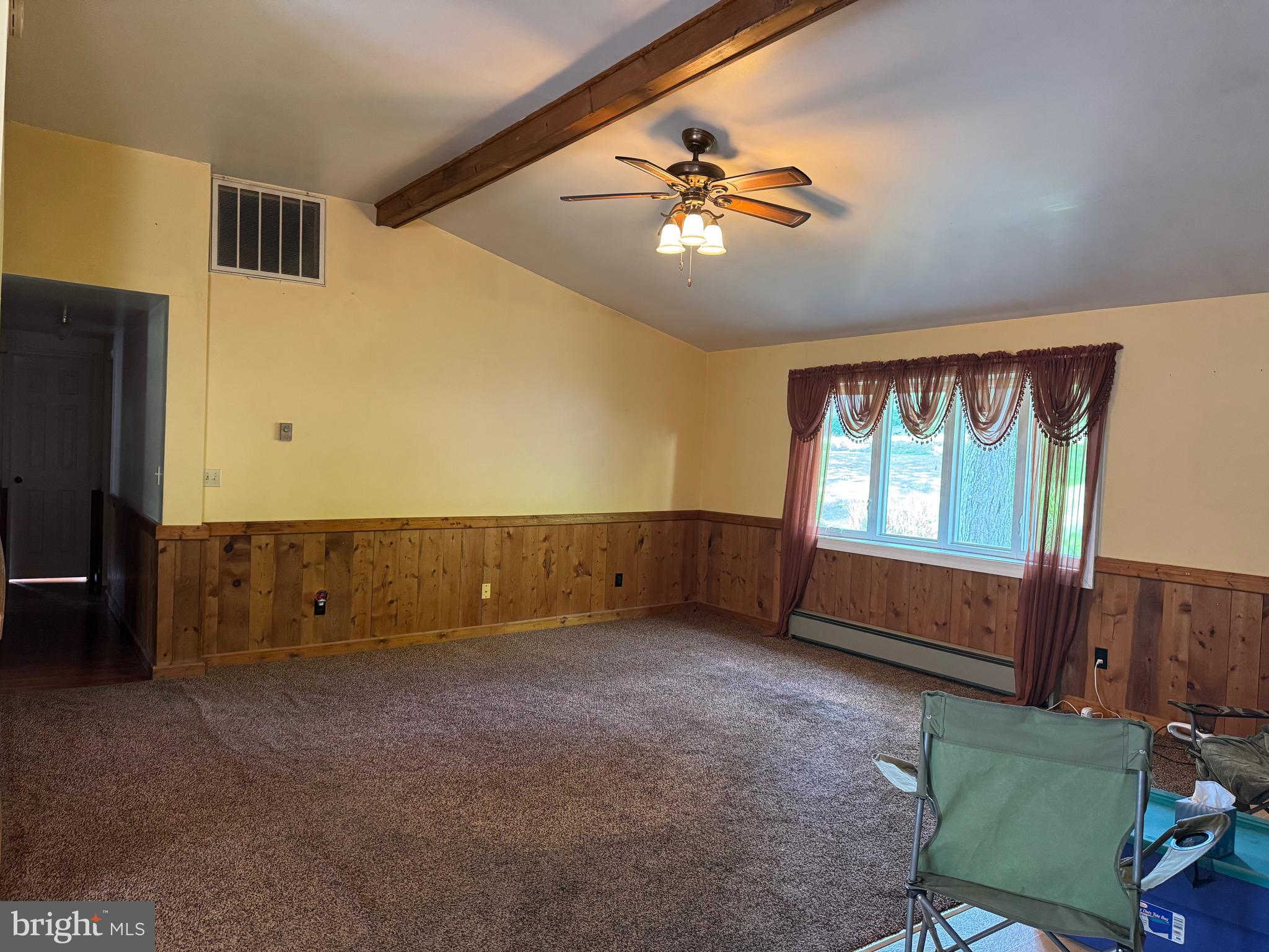 304 Cool Hollow Road Falling Waters, WV 25419 - Photo 24 of 42 wooden floor in an empty room with a window