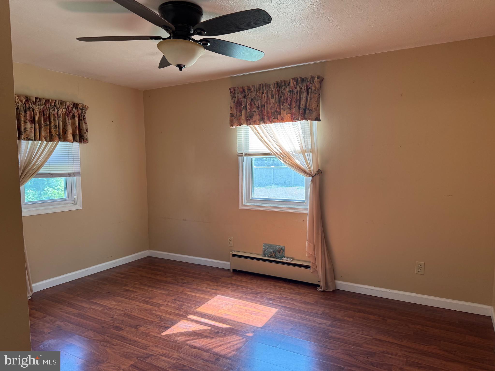 304 Cool Hollow Road Falling Waters, WV 25419 - Photo 35 of 42 a view of room with hardwood floor and ceiling fan