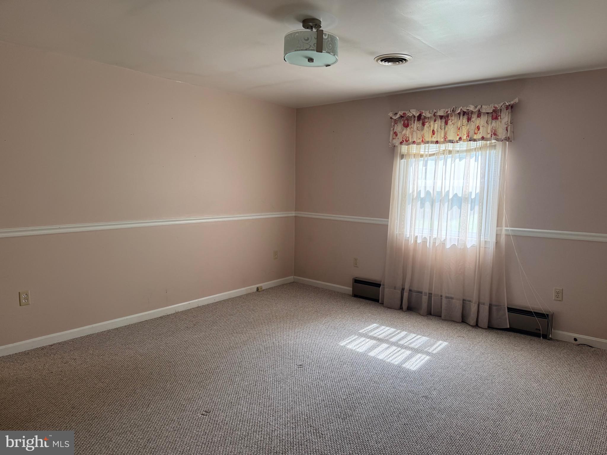 304 Cool Hollow Road Falling Waters, WV 25419 - Photo 39 of 42 an empty room with windows