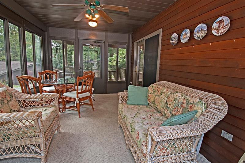 56 Creek Road Sandy Lake, PA 16145 - Photo 11 of 24 16x10 Sunporch with sliding doors to dining room,access to front porch.