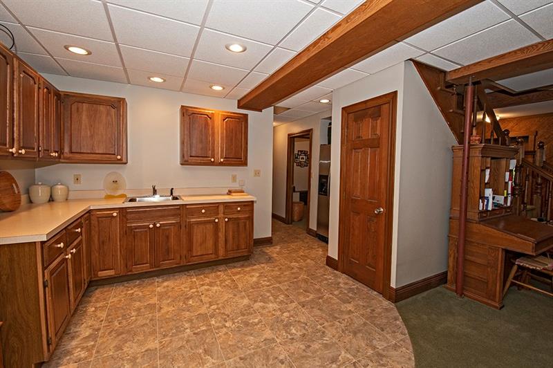 56 Creek Road Sandy Lake, PA 16145 - Photo 13 of 24 Lower level kitchen.