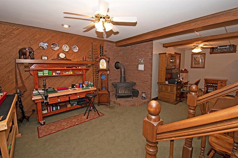 56 Creek Road Sandy Lake, PA 16145 - Photo 14 of 24 Lower level family room open to kitchen