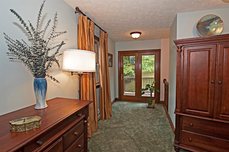 56 Creek Road Sandy Lake, PA 16145 - Photo 16 of 24 Master bedroom with balcony