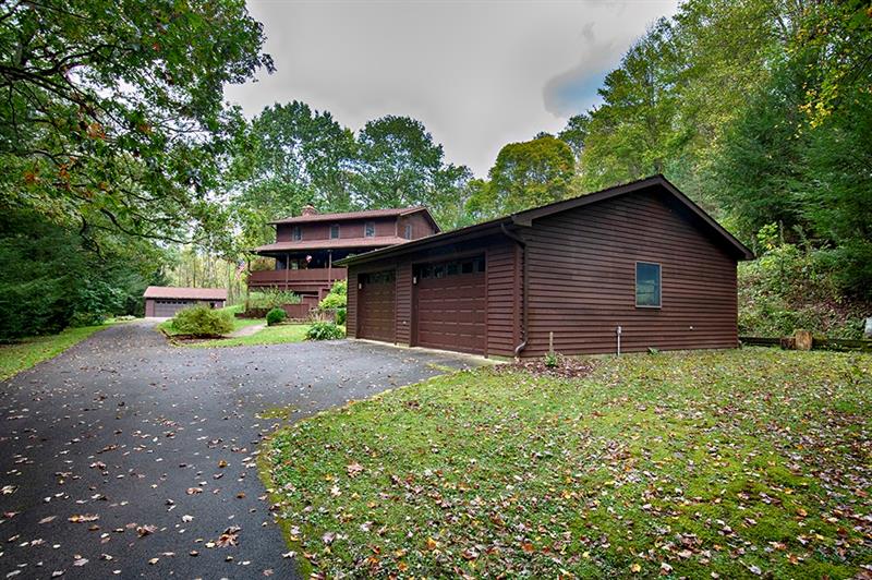 56 Creek Road Sandy Lake, PA 16145 - Photo 21 of 24 Two detached 2 car garages . Each with man door.