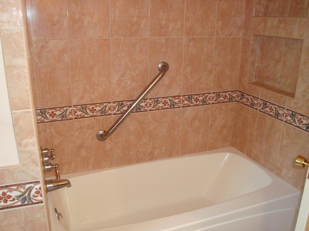 5337 Twilight Road Roanoke, VA 24019 - Photo 8 of 11 a bathroom with a shower and a bath tub