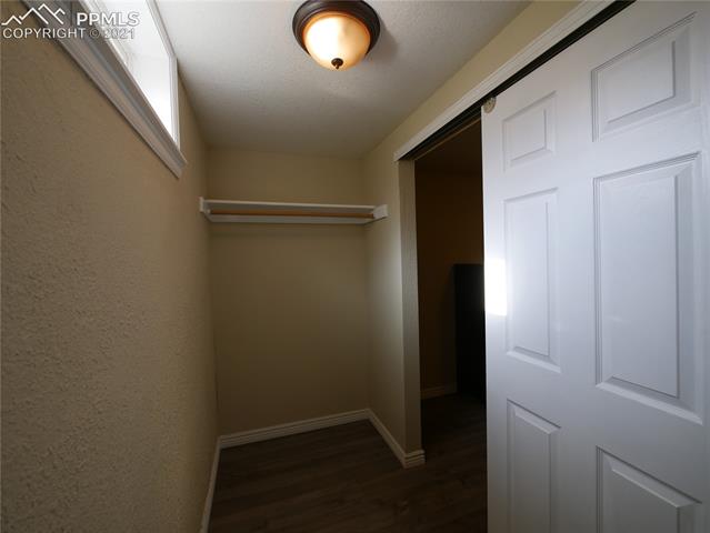 402 Yellowstone Road Colorado Springs, CO 80910 - Photo 26 of 28 Large Walk-in Closet of the basement bedroom