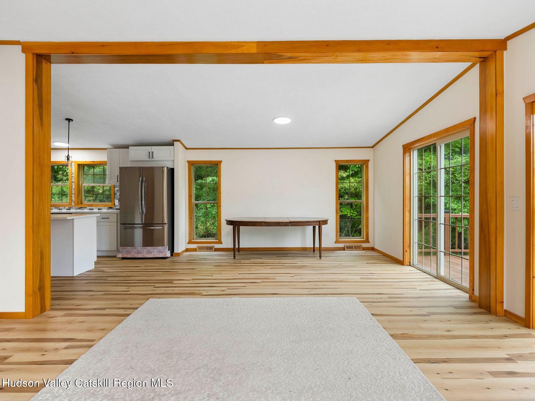 719 Allen Teator Road Durham, NY 12469 - Photo 14 of 38 a view of an empty room with a fireplace