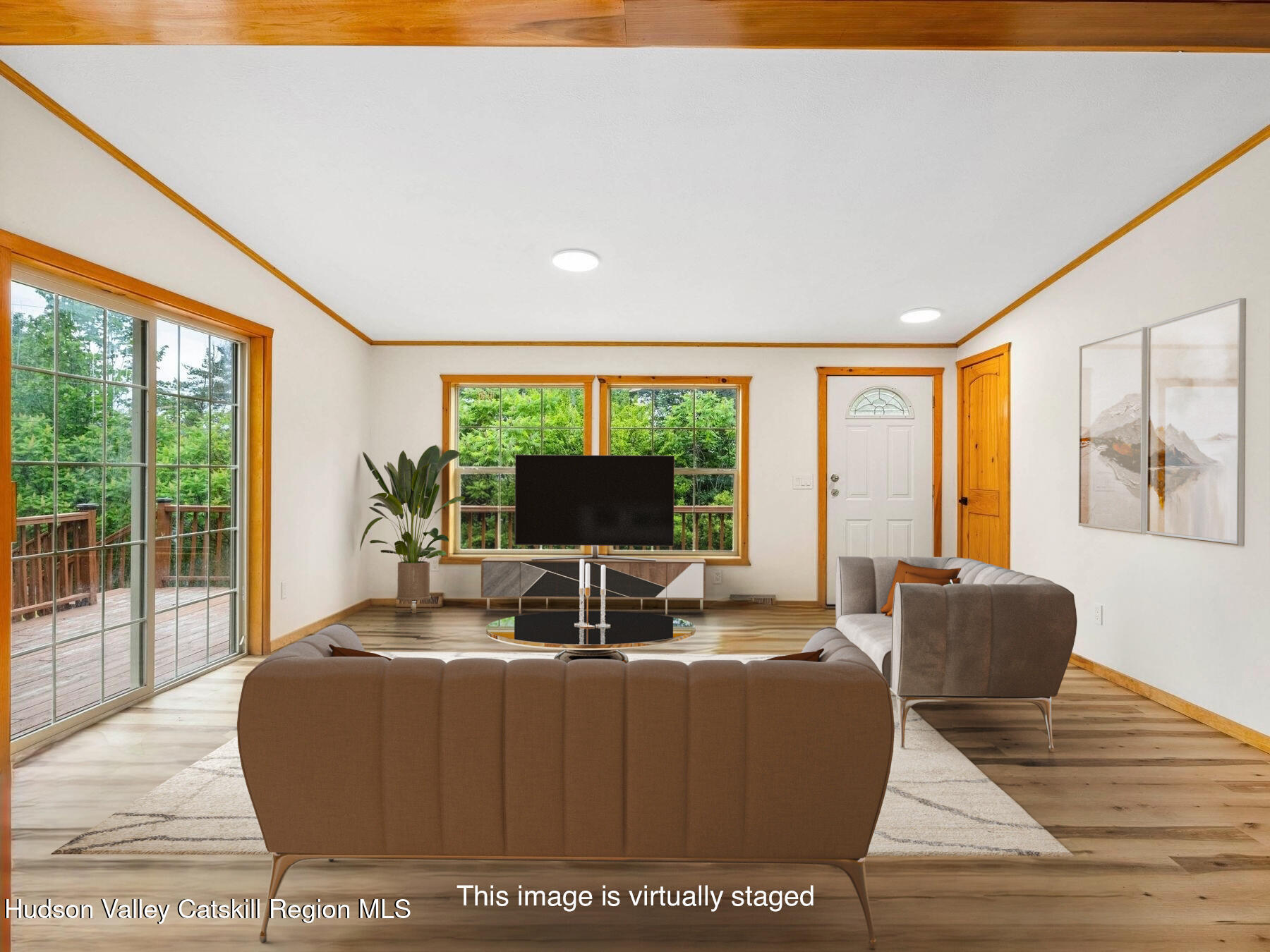 719 Allen Teator Road Durham, NY 12469 - Photo 2 of 38 a living room with furniture window and a flat screen tv