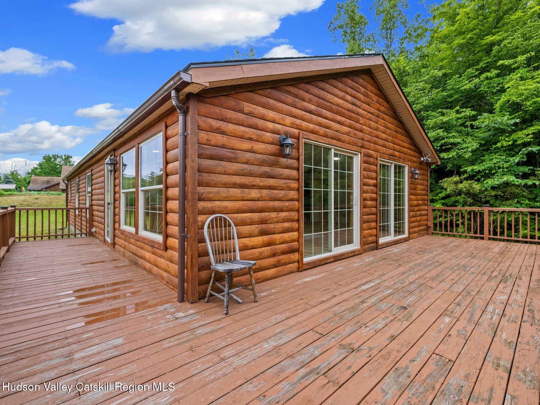 719 Allen Teator Road Durham, NY 12469 - Photo 29 of 38 a balcony view with a seating space