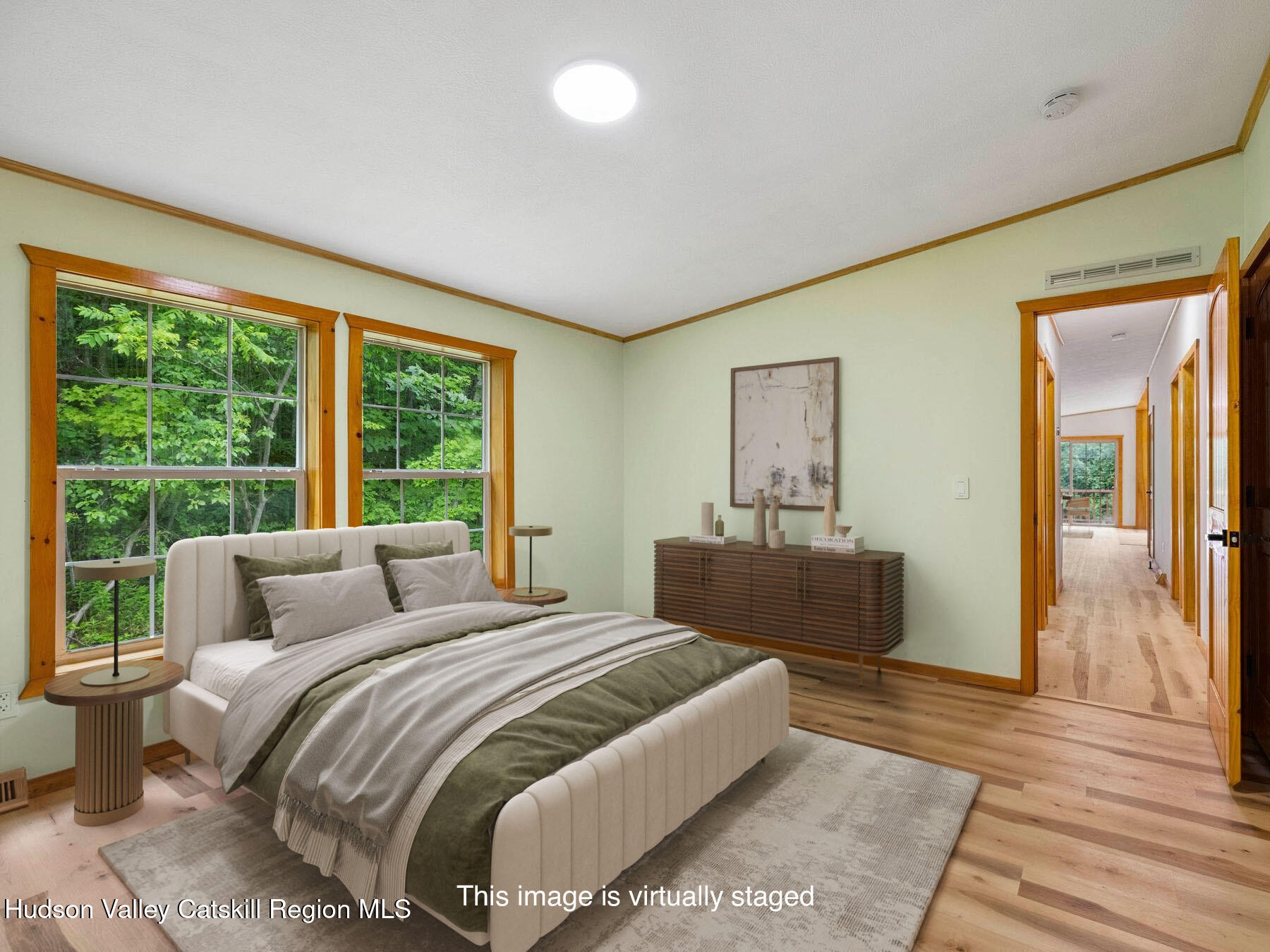 719 Allen Teator Road Durham, NY 12469 - Photo 9 of 38 a bedroom with a bed and a large window