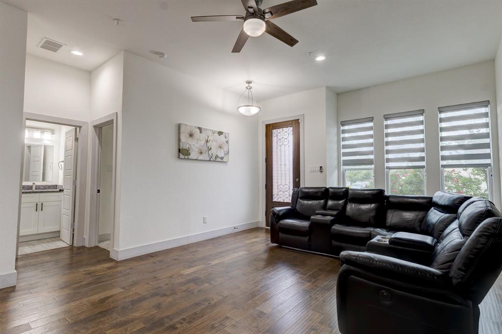 6043 Rivendell Drive Frisco, TX 75035 - Photo 11 of 38 a living room with furniture and a window