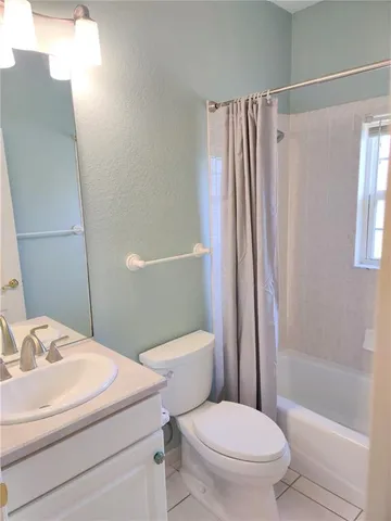 a view of a window in an empty room