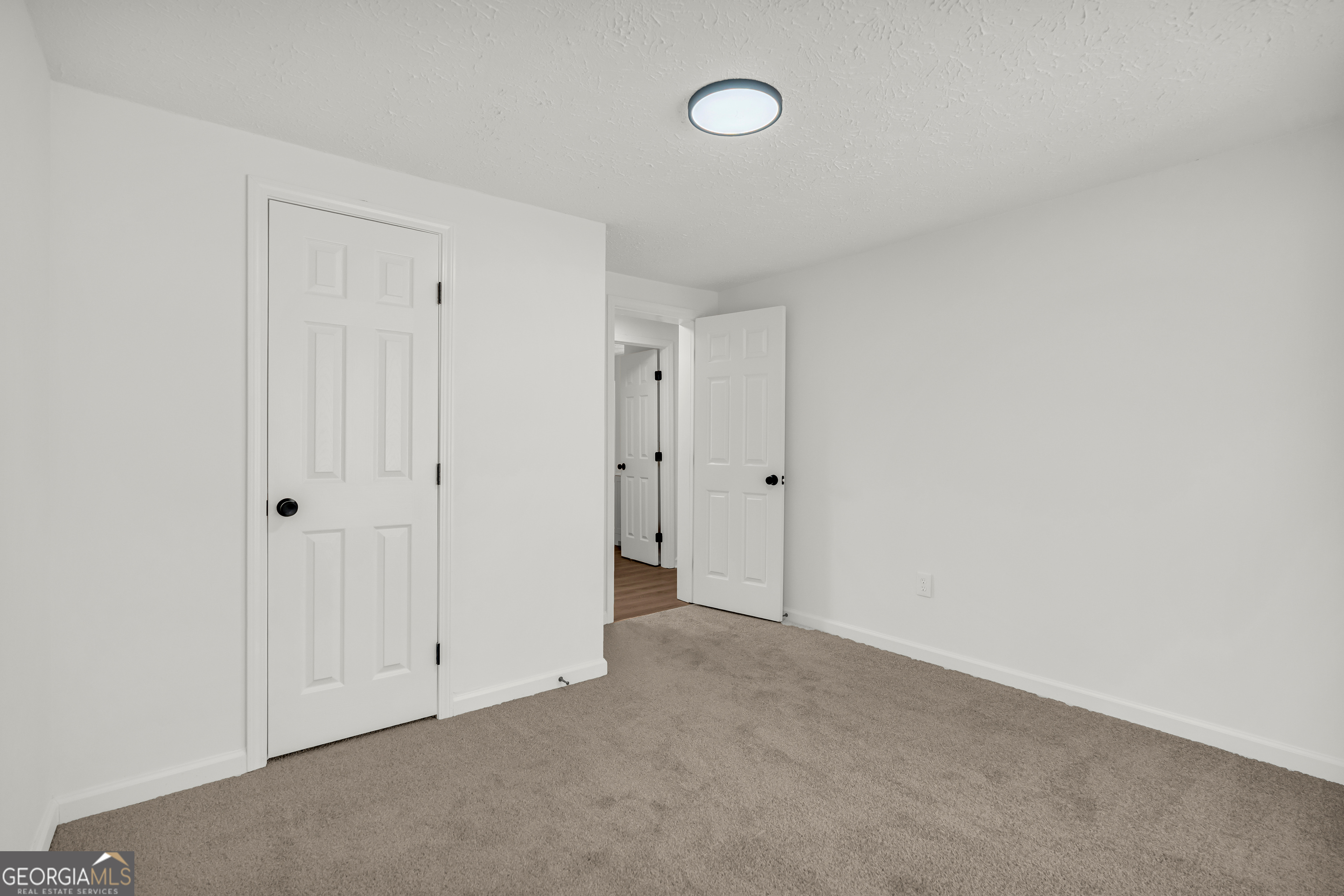 395 Barnetts Bridge Road Jackson, GA 30233 - Photo 14 of 82 a view of an empty room