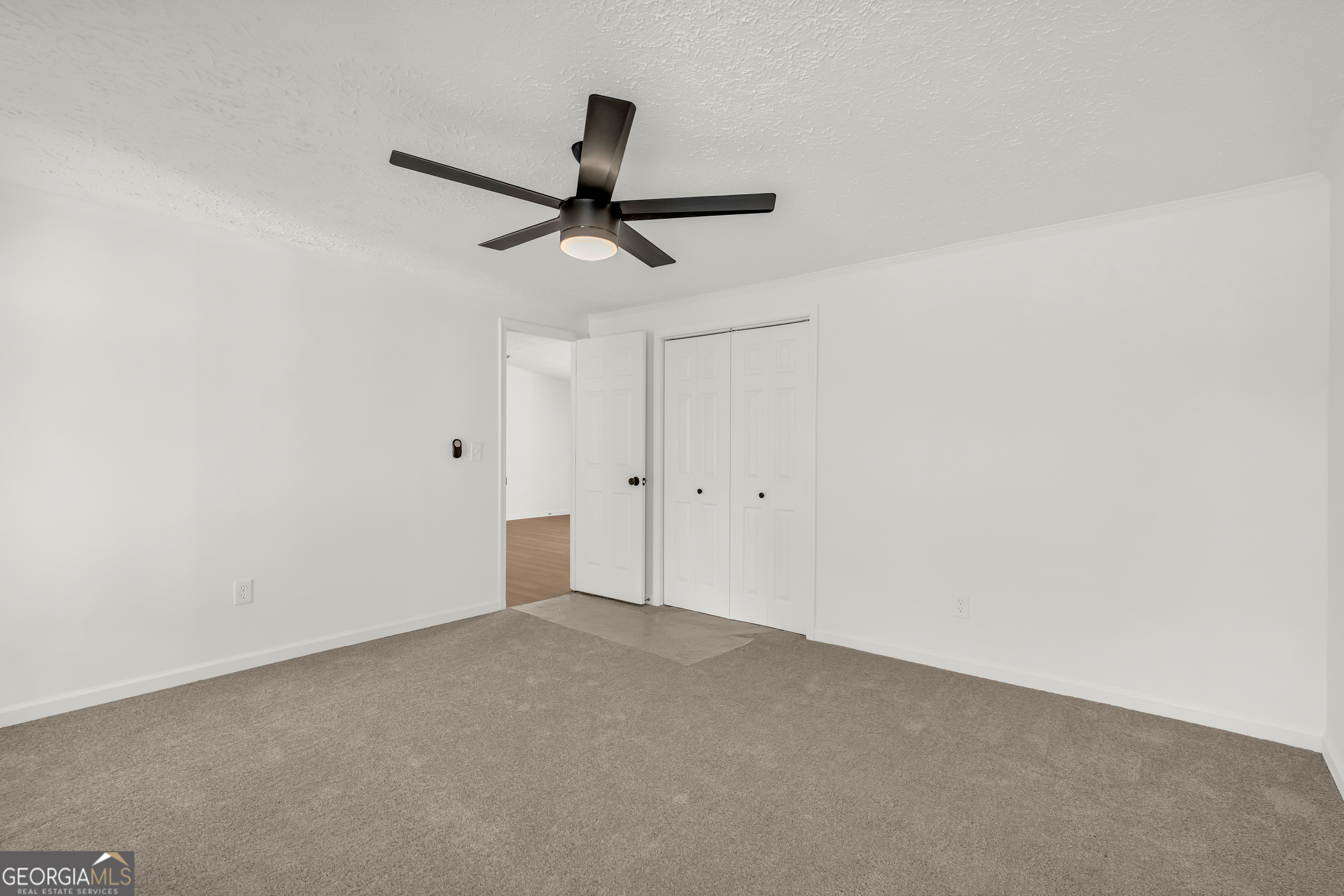 395 Barnetts Bridge Road Jackson, GA 30233 - Photo 18 of 82 a view of a room with a ceiling fan