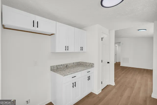 a view of a trees with a yard