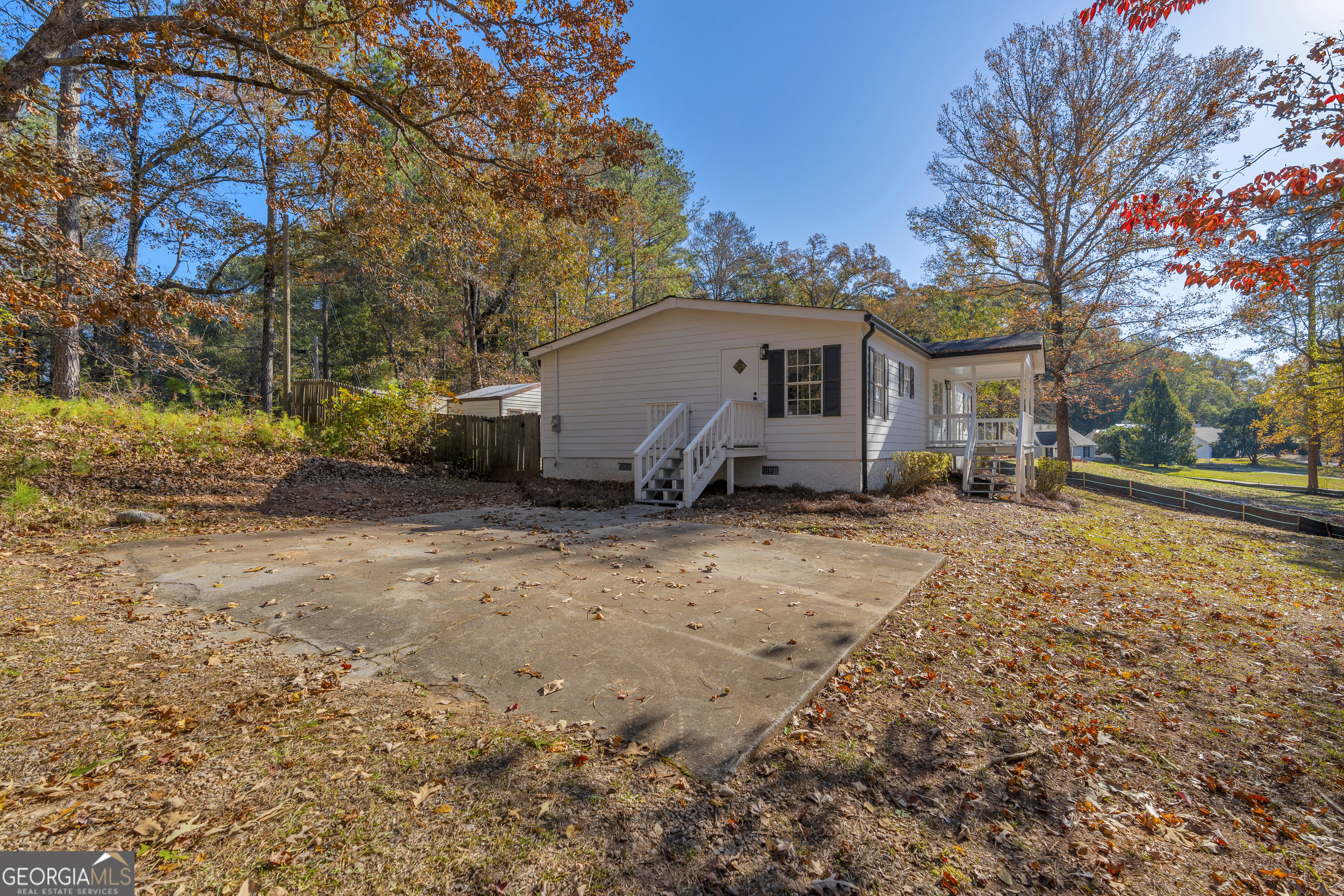 395 Barnetts Bridge Road Jackson, GA 30233 - Photo 53 of 82 a view of a house with a yard