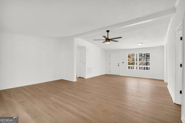 a view of a hallway with closet
