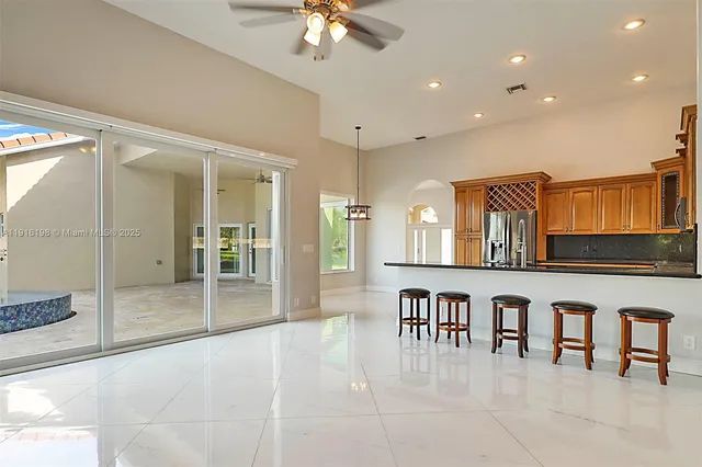 a bathroom with a window and a shower