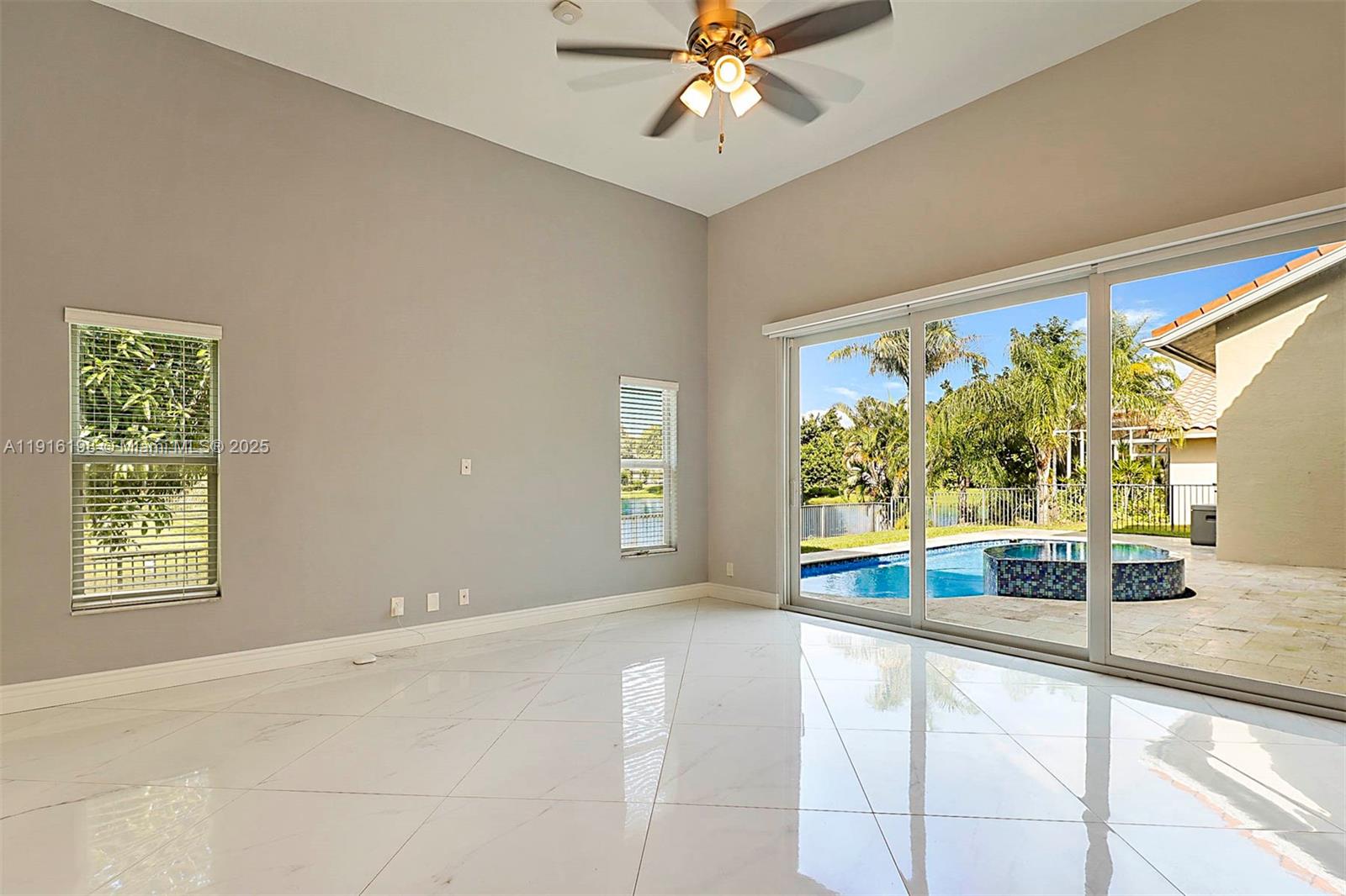 10133 Northwest 48th Drive Coral Springs, FL 33076 - Photo 21 of 49 a view of an empty room and window