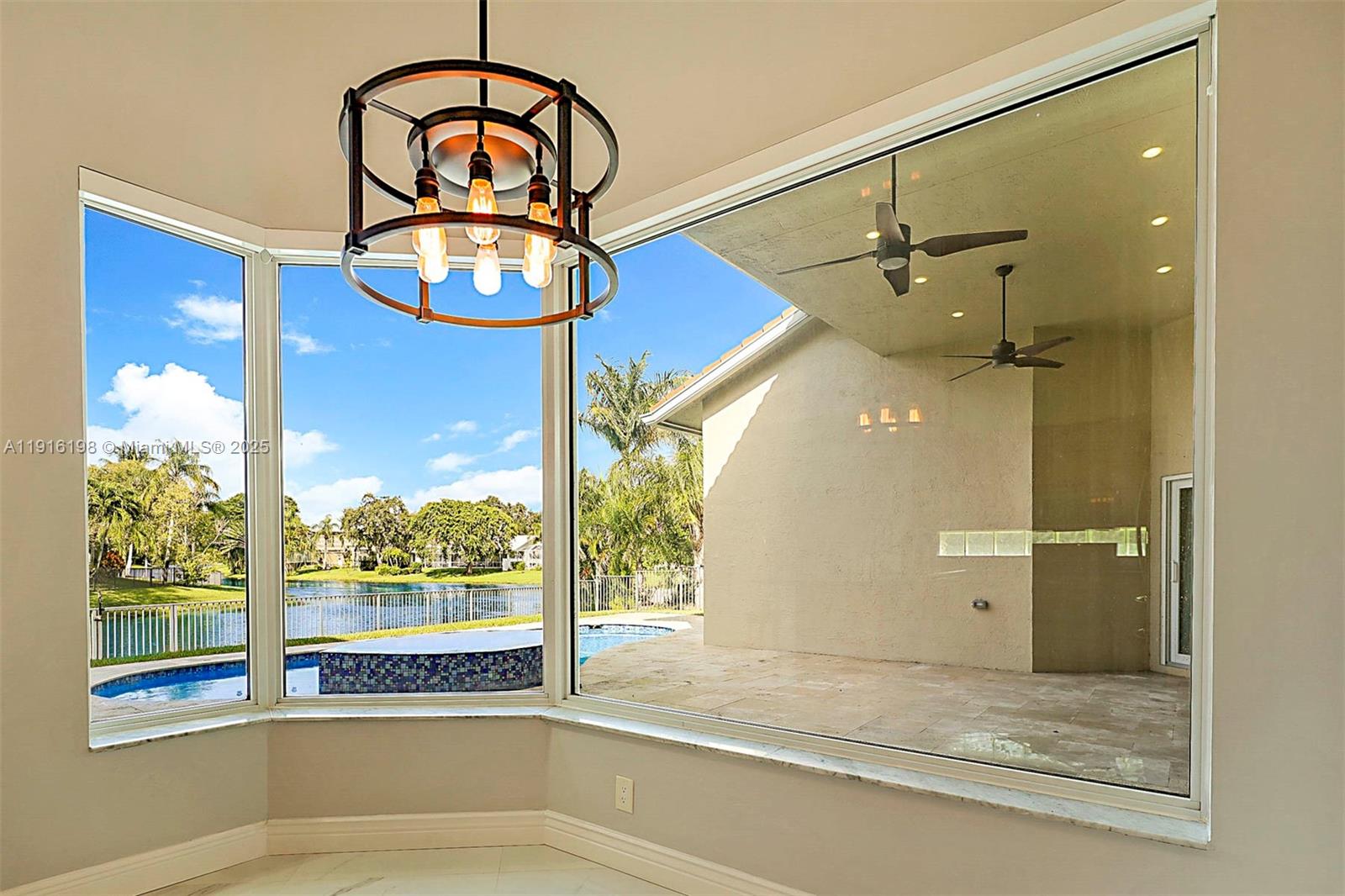 10133 Northwest 48th Drive Coral Springs, FL 33076 - Photo 22 of 49 a bathroom with a window and a shower