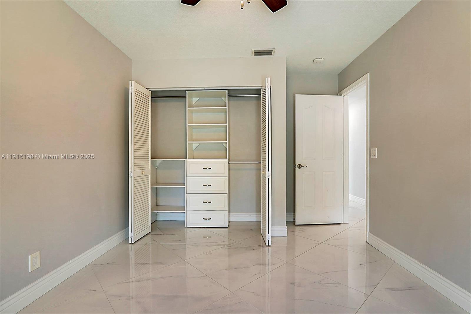 10133 Northwest 48th Drive Coral Springs, FL 33076 - Photo 32 of 49 a view of closet