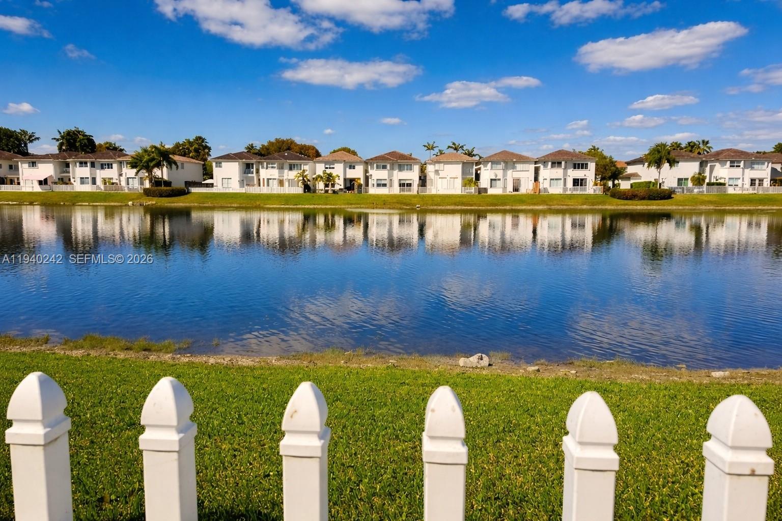 11541 Northwest 68th Terrace Doral, FL 33178 - Photo 16 of 18 lake view from patio