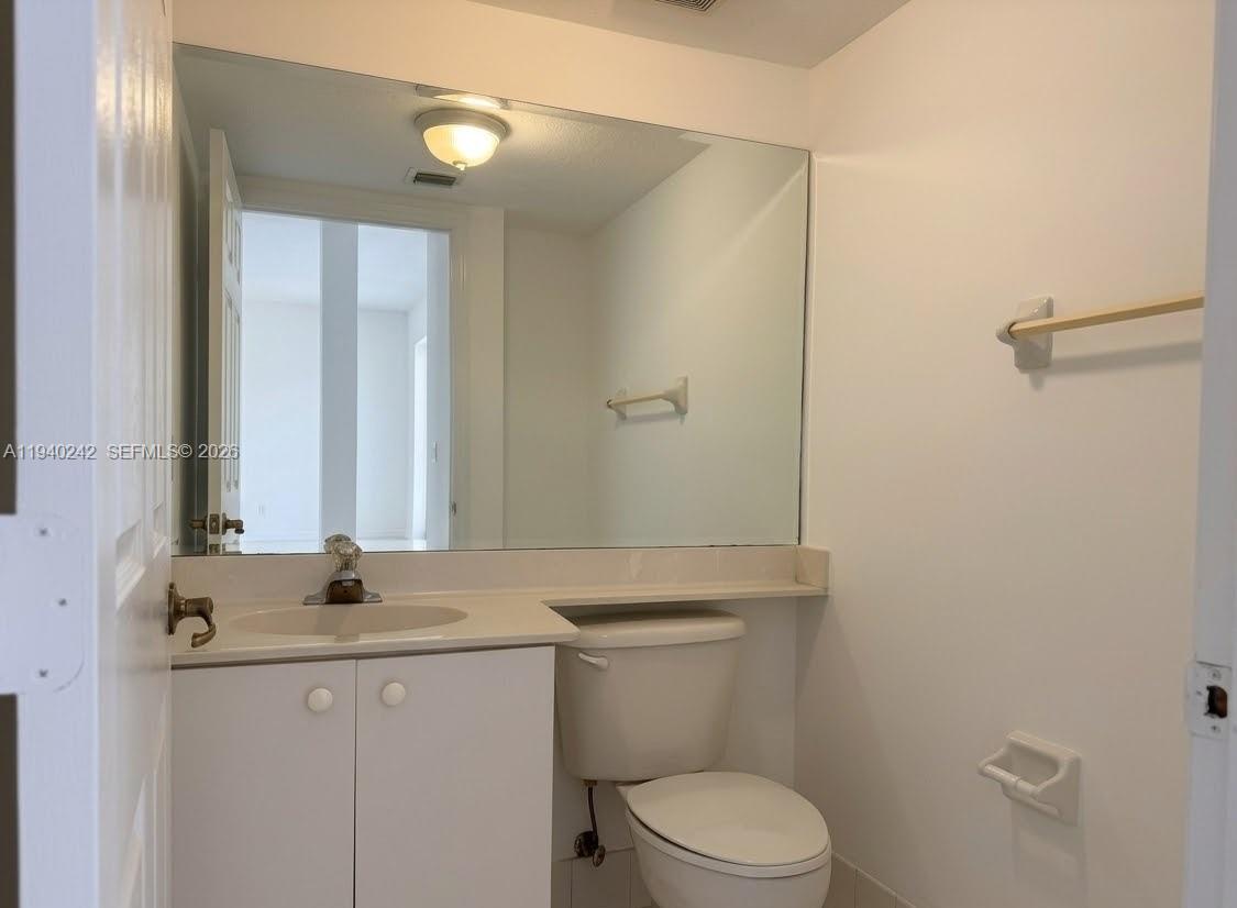 11541 Northwest 68th Terrace Doral, FL 33178 - Photo 8 of 18 first floor bathroom