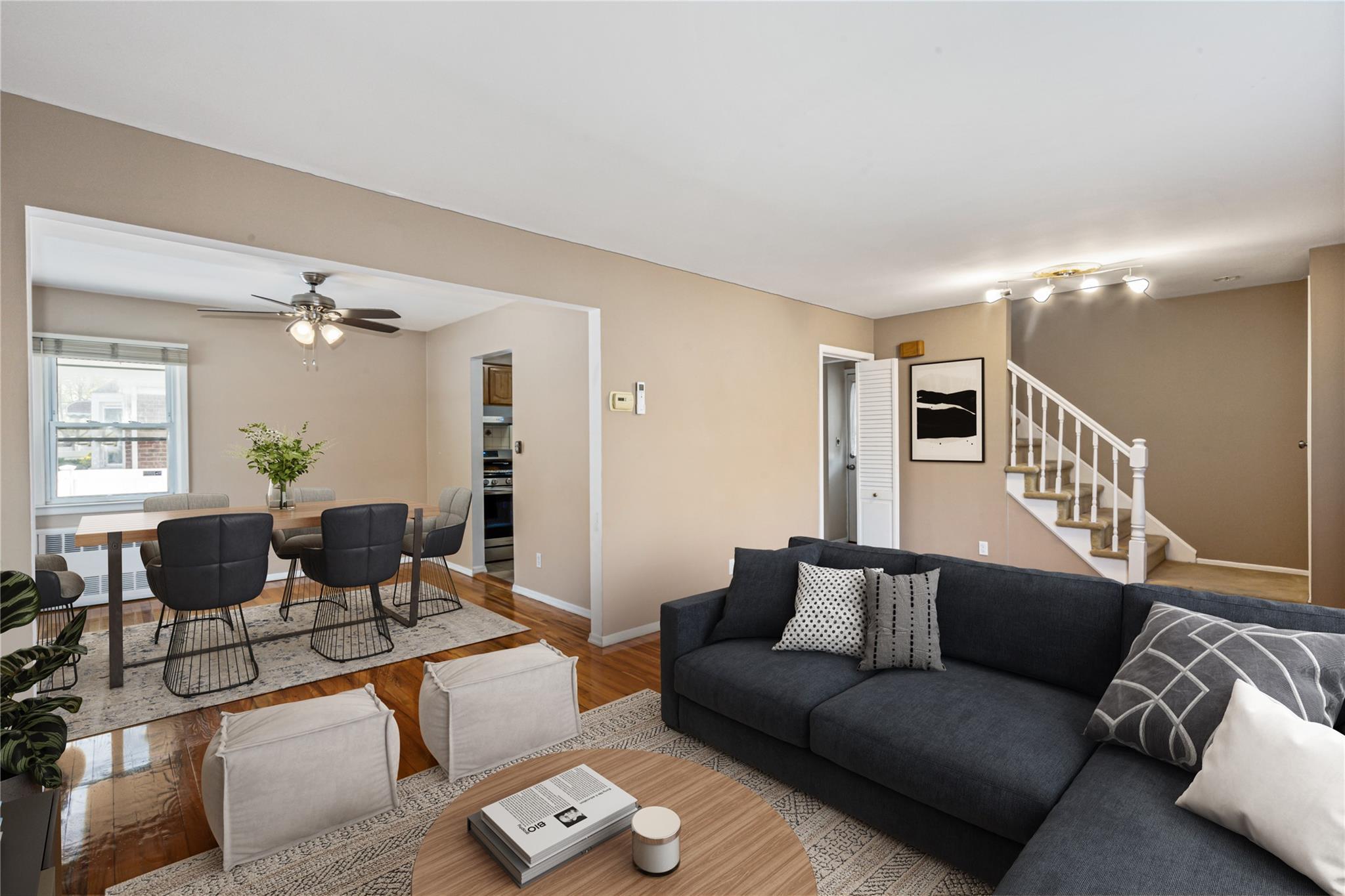 83-03 258th Street Queens, NY 11004 - Photo 5 of 20 a living room with furniture and wooden floor